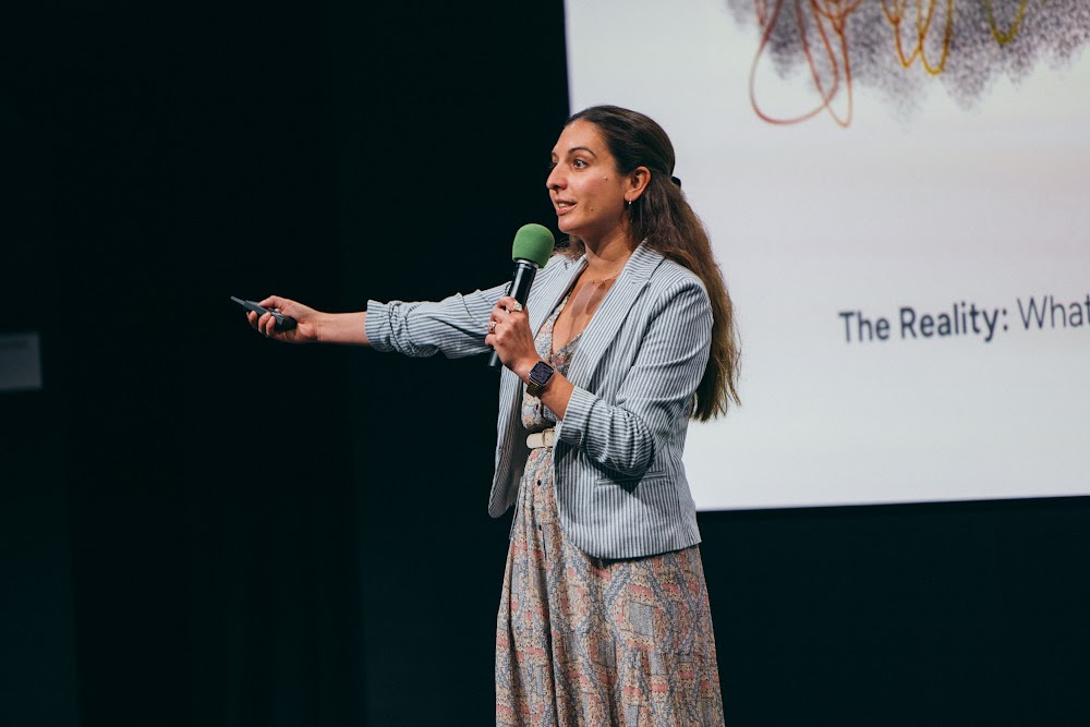 Jaclyn Konzelmann giving a keynote on AI products (photo 1)